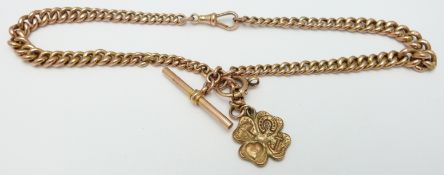 A 9ct rose gold graduated double Albert with 9ct gold four leaf clover pendant , 21.3g