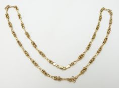 A 9ct gold necklace made up of knotted links, 8.7g