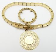 An 18ct gold bracelet made up of segmented rectangular links, an 18ct gold fob/ charm and an 18ct