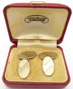 A pair of 9ct gold cufflinks with engine turned decoration, 5.6g