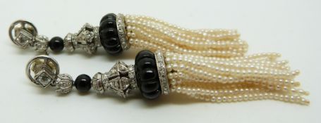 A pair of 9ct white gold Art Deco chandelier earrings set with old cut diamonds and onyx and with