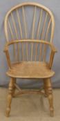 A 19thC elm seated stick back Windsor chair with pierced back splat and crinoline stretcher, 89cm
