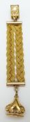 A yellow metal Albert/fob with woven strand and swing fob
