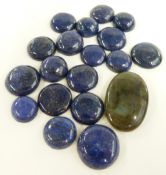 Eighteen lapis lazuli cabochons and a labradorite cabochon