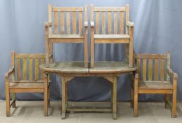 Teak extending garden table length min 146 max 194cm and four armchairs