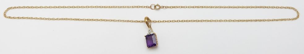 A 9ct gold necklace set with an emerald cut amethyst, 3.2g