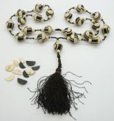Art Deco ebony and ivory bead necklace, purchased 1956
