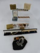 A collection of costume jewellery including watches, marcasite and enamel brooch, cameo, crystal