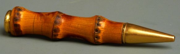 Cartier gold mounted bamboo pencil circa 1940, with French standard marks, 10.5cm long.