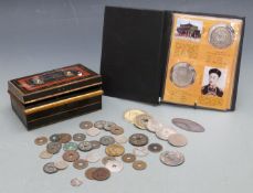 A collection of Chinese coinage, some in a folder.