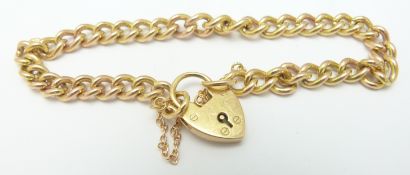 A 9ct gold curb link bracelet with heart padlock, 17.8g