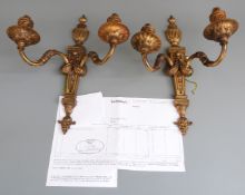 Pair of early 20thC gilt metal twin branch wall lights, with receipt from the 2004 Sotheby's sale of