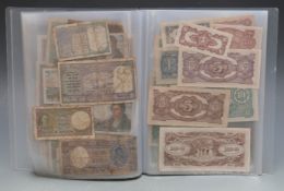 Over sixty world banknotes in a collector's folder to include Germany, China, Chile, Austria,