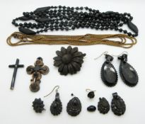 A quantity of Victorian jet earrings, jet brooch, gilt guard chain etc