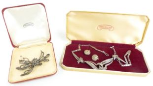 A silver necklace set with marcasite, earrings and brooch