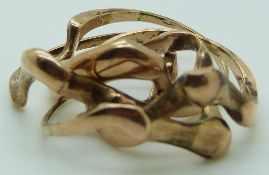 A 9ct gold puzzle ring, 6g.