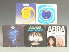Approximately 350 singles including Disco, Soul, Pop and 1960s, in six cases