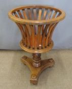 A mahogany jardiniere stand, H68cm, diameter 47cm