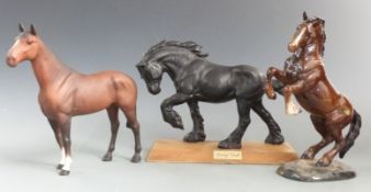 Three Beswick horses including black Spirit of Earth, The Winner and rearing horse, tallest 27cm