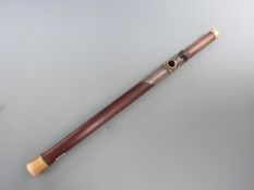 A late 19thC Chinese opium pipe, the white metal mount decorated with an insect and Chinese