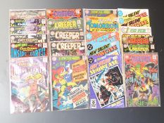 Twenty-two DC comics comprising Inside Earth 33, 41, 48, 49 x2 and 52, Tommy Tomorrow Showcase 41,