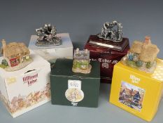 Two Tudor Mint Myth & Magic figures including The Hobbit and three Lilliput Lane cottages, all boxed