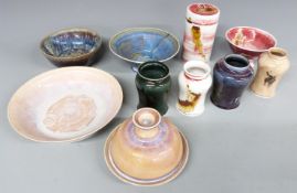 A collection of Leslie Parrot Studio pottery vases, bowls and covered containers, tallest 15cm