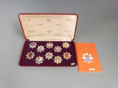 A cased set of London Fire Brigade limited edition historic badges