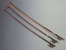 Three viola bows, one having a plain frog, 72.9g, another with Parisian frog eye, 70g, the third
