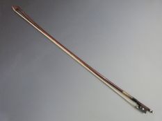 Violin bow round stick, stamped Knoll, plain mother of pearl eye to frog, three piece button, 65g