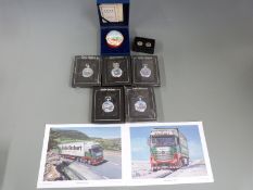Five Eddie Stobart collectors pocket watches together with an enamelled Roger Bannister pin dish and