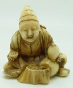 Japanese Meiji period signed ivory netsuke of a seated man with double gourd water bottle, H5.5cm