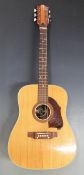 Hoyer acoustic guitar fitted with six steel strings on individual machine heads and semi round back,