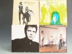 Approximately 80 albums mostly pop and rock including Fleetwood Mac, Genesis, Eurythmics etc