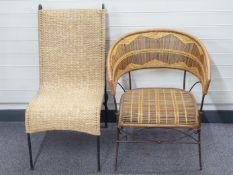Two wicker/rafia wrought iron chairs