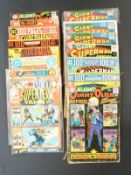 Fourteen DC comics comprising Super-Team Family Giant 2 and 3, The Superman Family 211 and 100