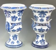 A pair of blue and white campana pedestal urns with 'India Jane, London' to base, H48cm