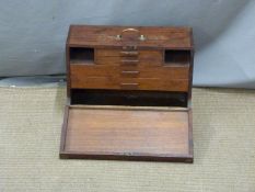 A vintage brass bound, fall flap mahogany tool chest with fitted interior and brass handle, W46