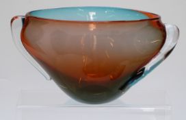 William Walker art glass vase with twin handles and orange and blue colouration, 25.5cm in diameter.