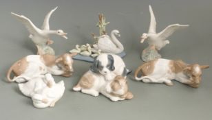 A collection of Lladro and Nao bird and animal figures, tallest 16cm