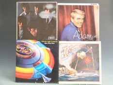 Approximately 100 albums of mixed genres