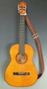 Tatra acoustic guitar fitted with six nylon strings, in soft carry case
