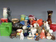 A collection of novelty ceramics and collectables including Carltonware Red Baron teapot, Guinness