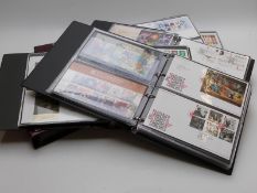 Six First Day Cover albums containing covers and presentation packs from 2006 to 2013