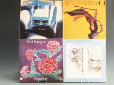 Approximately 100 albums, mostly Rock, including Todd Rungren, The Tubes, Steve Hillage, Steve