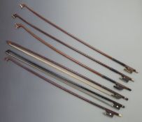 Six round stick violin bows, various button types including bone, ebony, four with plain frogs