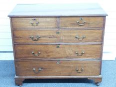 A 19thC mahogany chest of two over three graduated drawers raised on bracket feet, W106 x D55 x
