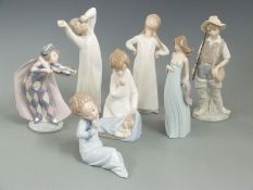 Seven Lladro figures including violinist, tallest 22cm