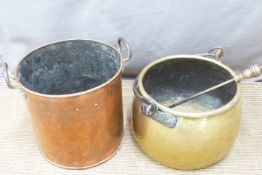 Two coal scuttles, one brass, one copper and a poker