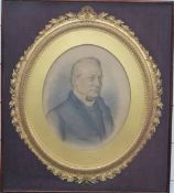 Framed photograph of a Victorian or Edwardian gentleman in oval gilt frame wooden mount, overall